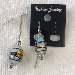 Sterling silver threaded earrings with a glass bead. Handcrafted.